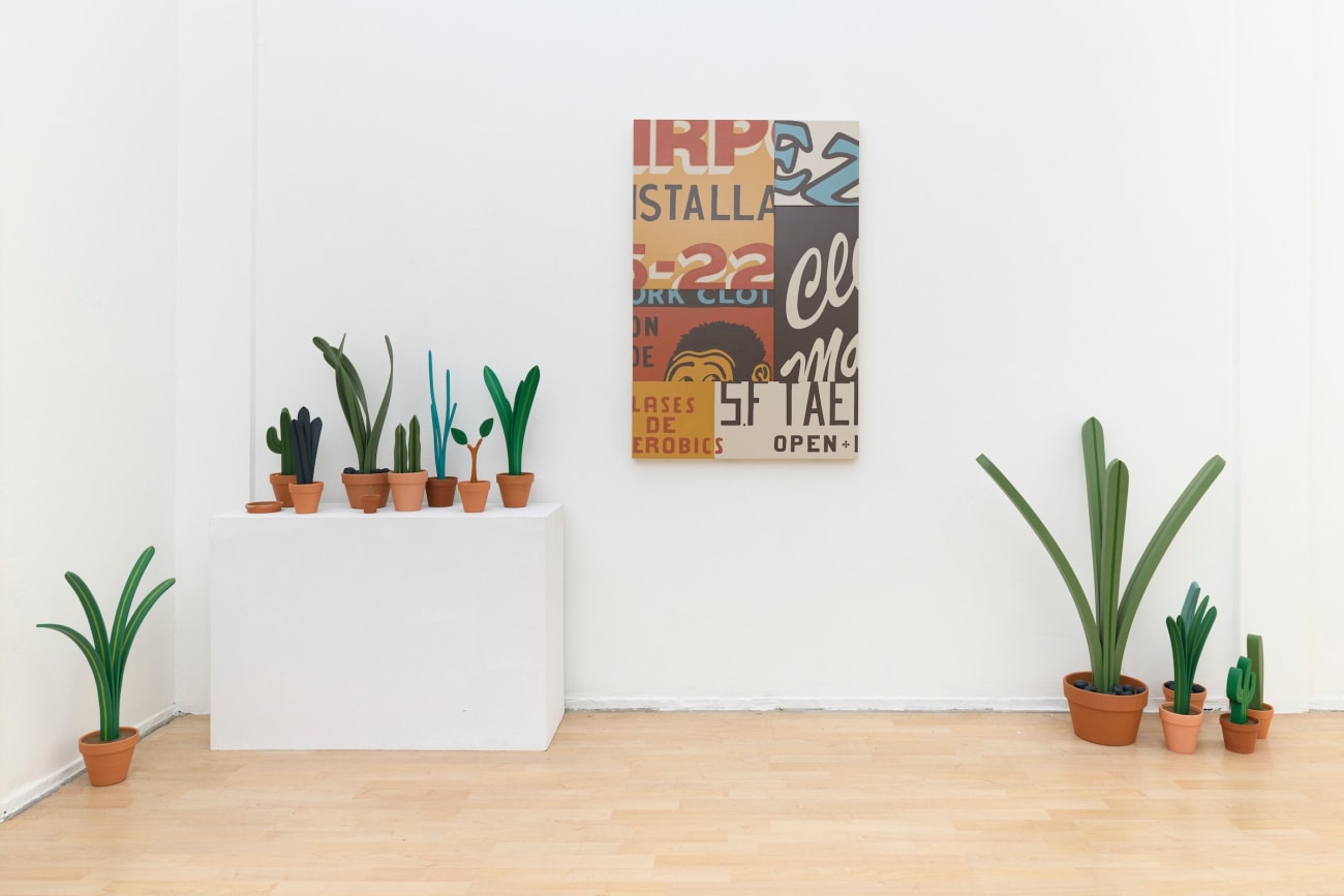 installation view of Jeff Canham's wooden sculpture plants in a gallery