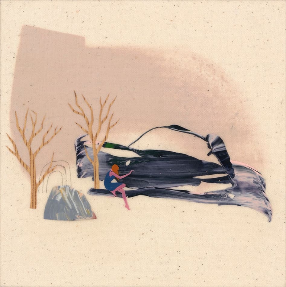 small composition of a woman sitting amidst two bare trees and various sized boulders.