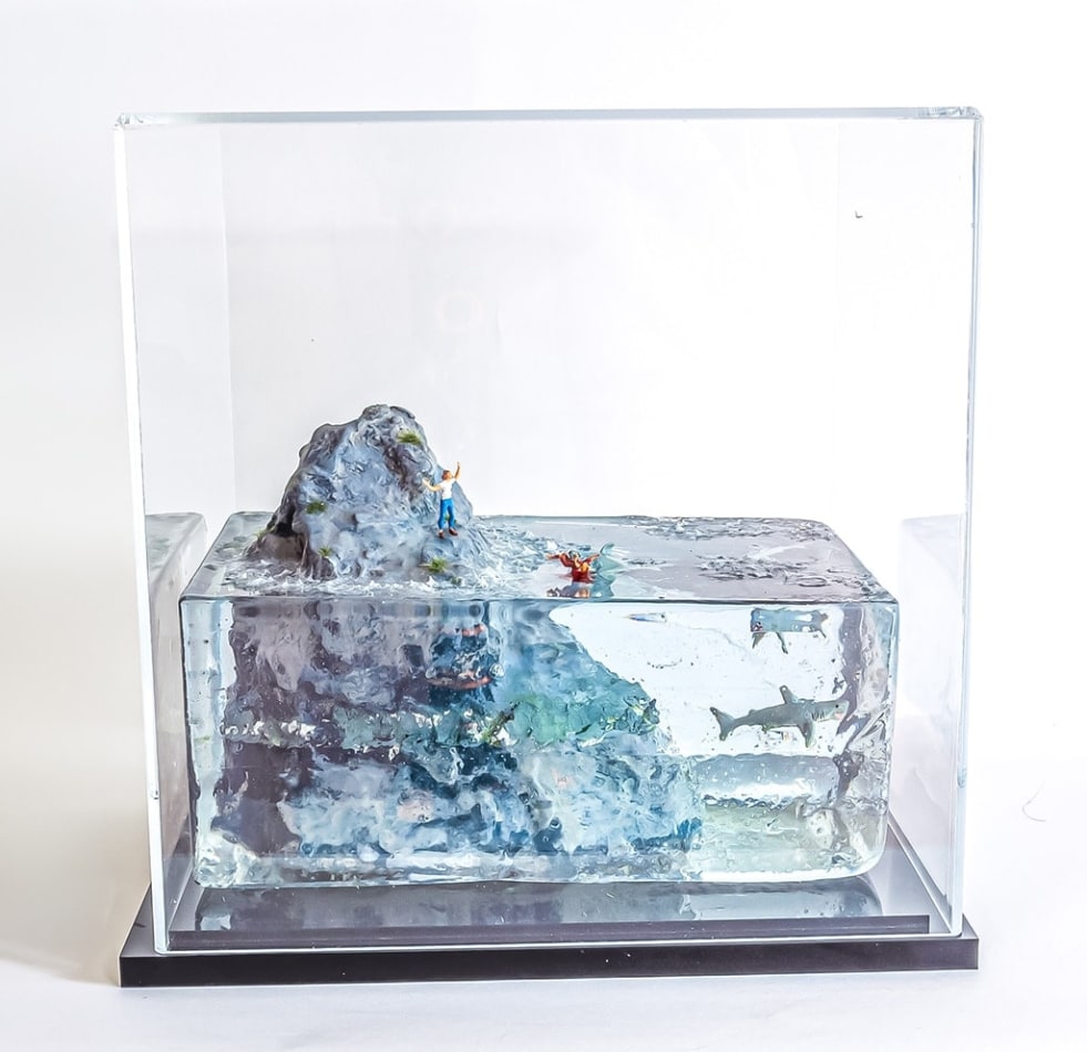 artwork with glass case over it