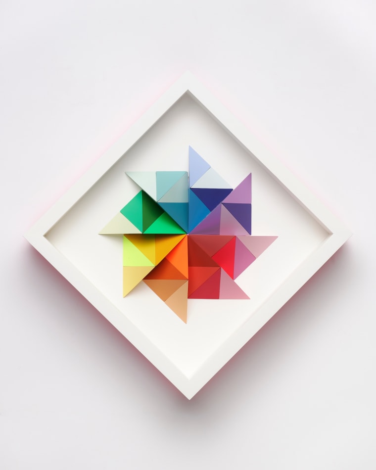 wooden geometric wall sculpture by Sean newport - rainbow