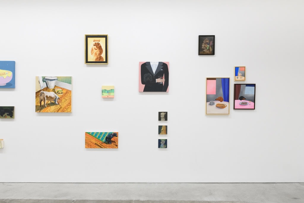Installation view of a gallery wall with various artworks installed in a salon-style at Hashimoto Contemporary San Francisco