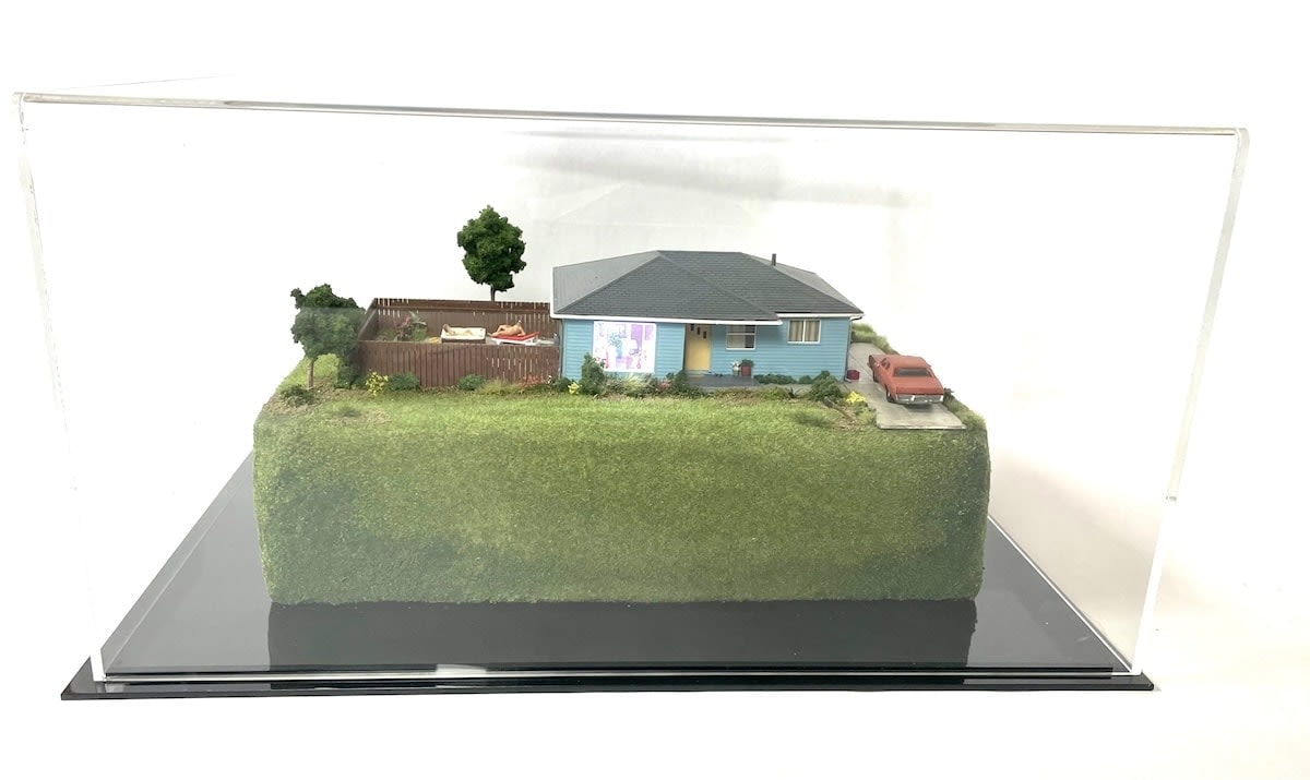 sculpture in glass case