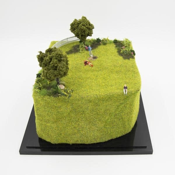 miniature of a person burying a body