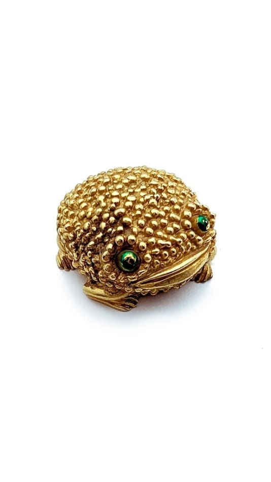 gold frog shaped compact with green eyes