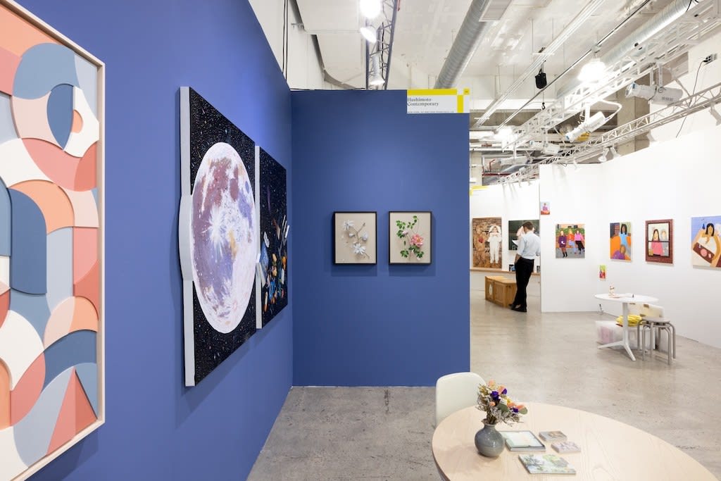 installation view of Hashimoto Contemporary booth at future fair featuring paintings on dark blue walls