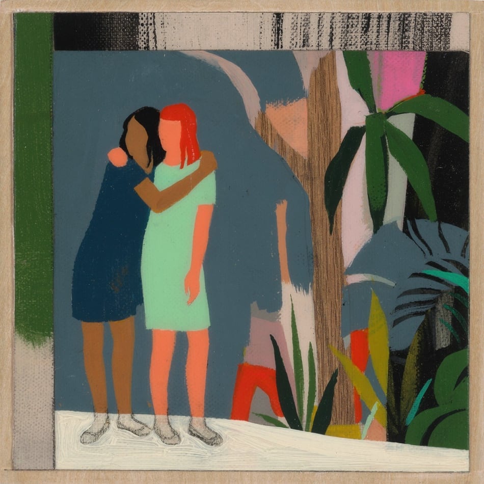 two woman embracing in front of a grey wall surrounded by a beige border