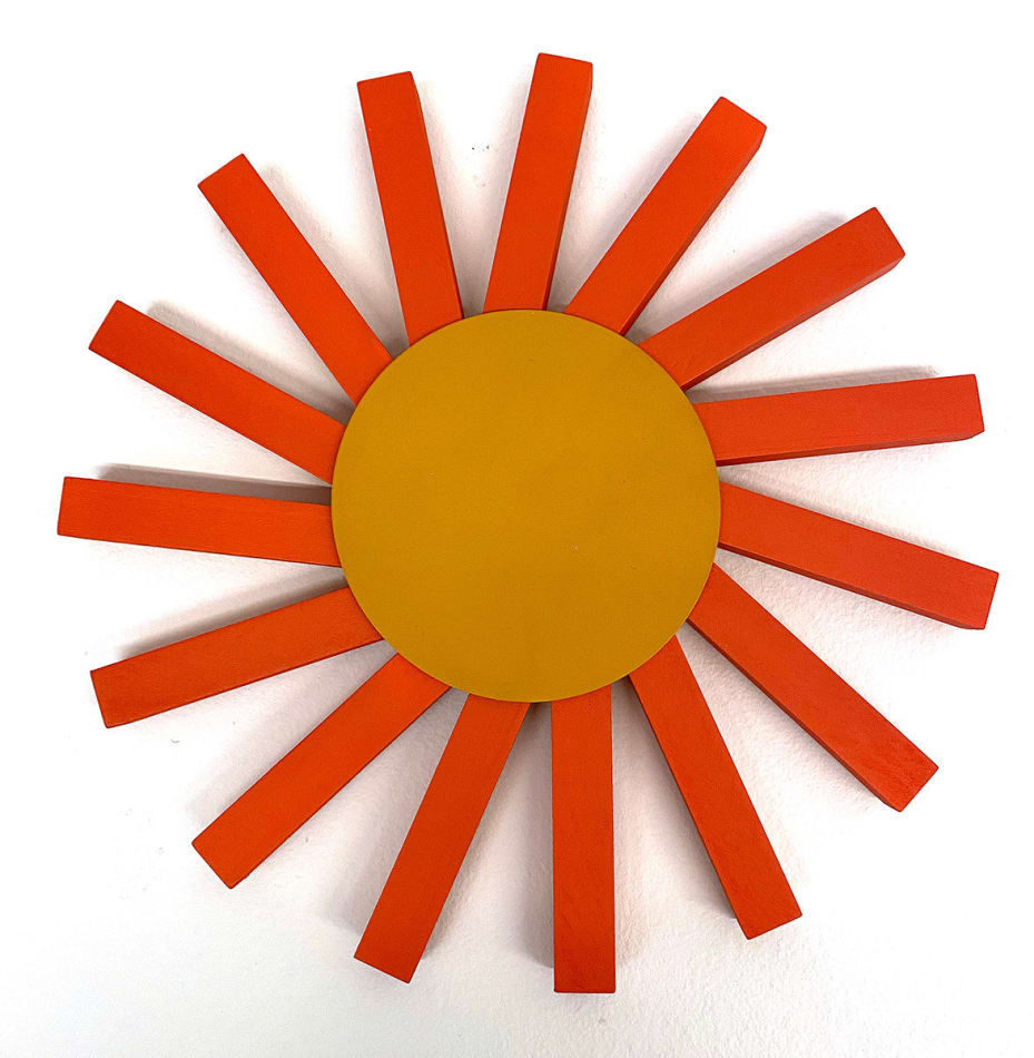 Jeff Canham wooden sculpture of orange and yellow sun