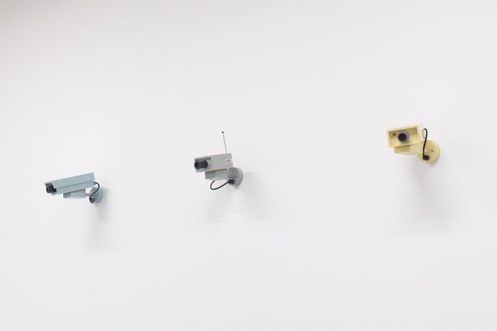 Three sculptures of CCTV cameras by Jeff Canham.