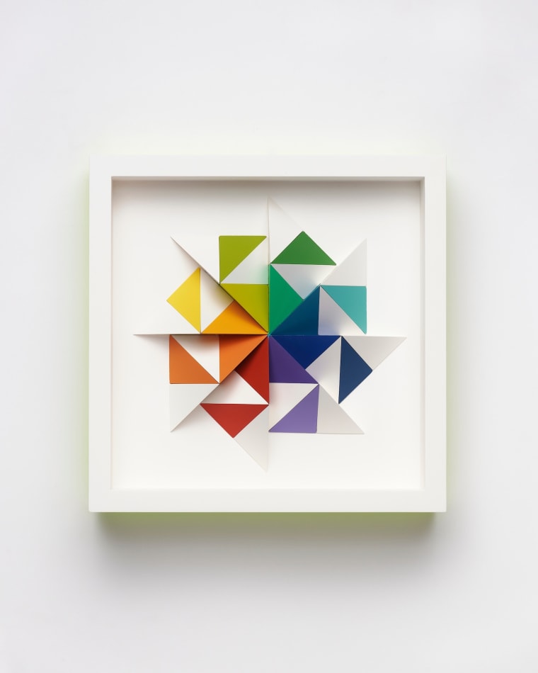 wooden geometric wall sculpture by Sean newport - rainbow