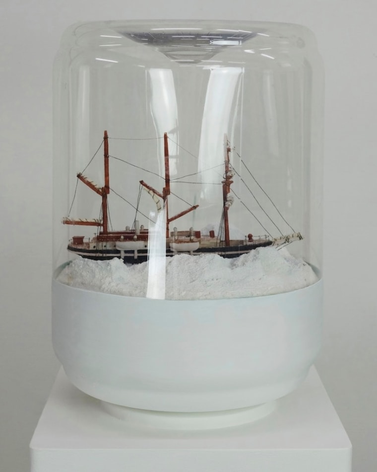 Paul Gagner sculpture of a ship in frozen waters inside of an office water jug