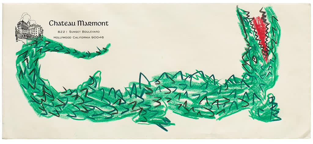 Drawing of a green crocodile on an envelope