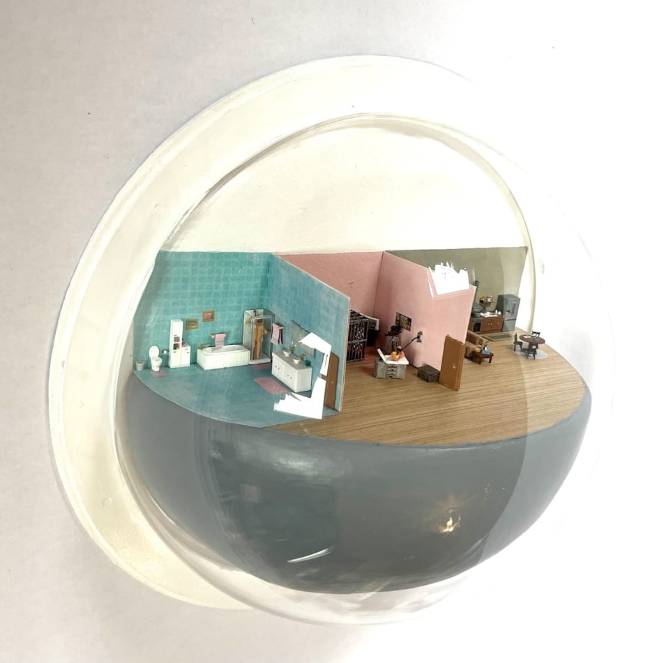 sculpture in glass case