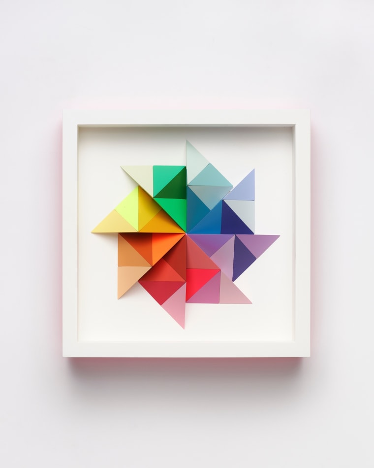 wooden geometric wall sculpture by Sean newport - rainbow