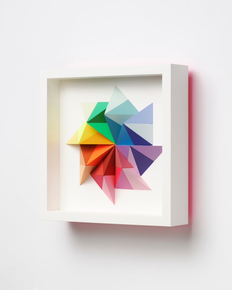 wooden geometric wall sculpture by Sean newport - rainbow