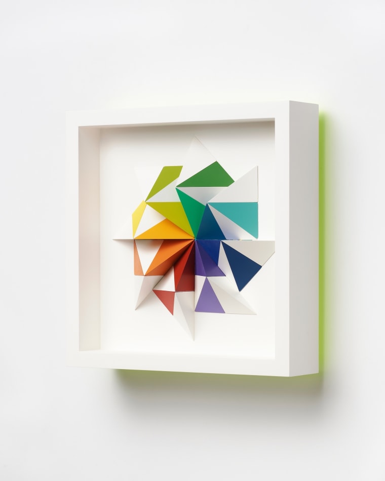 wooden geometric wall sculpture by Sean newport - rainbow