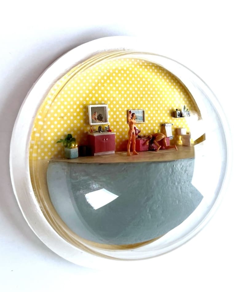 sculpture in glass case