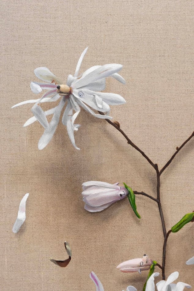 detail of painting of white flowers with subtle dog faces