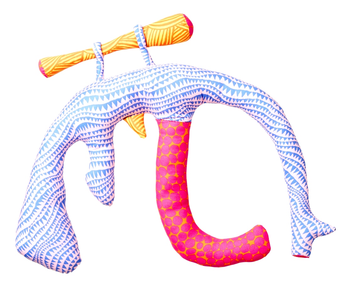 Natalie Baxter soft sculpture of gun in purple, pink and yellow
