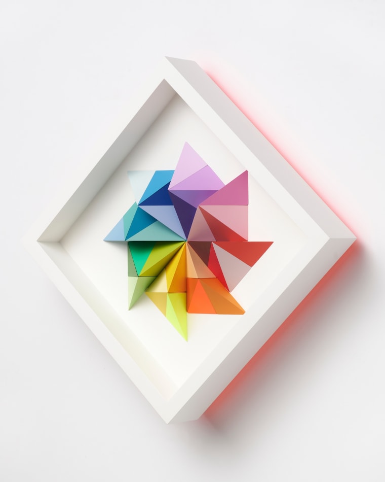 wooden geometric wall sculpture by Sean newport - rainbow