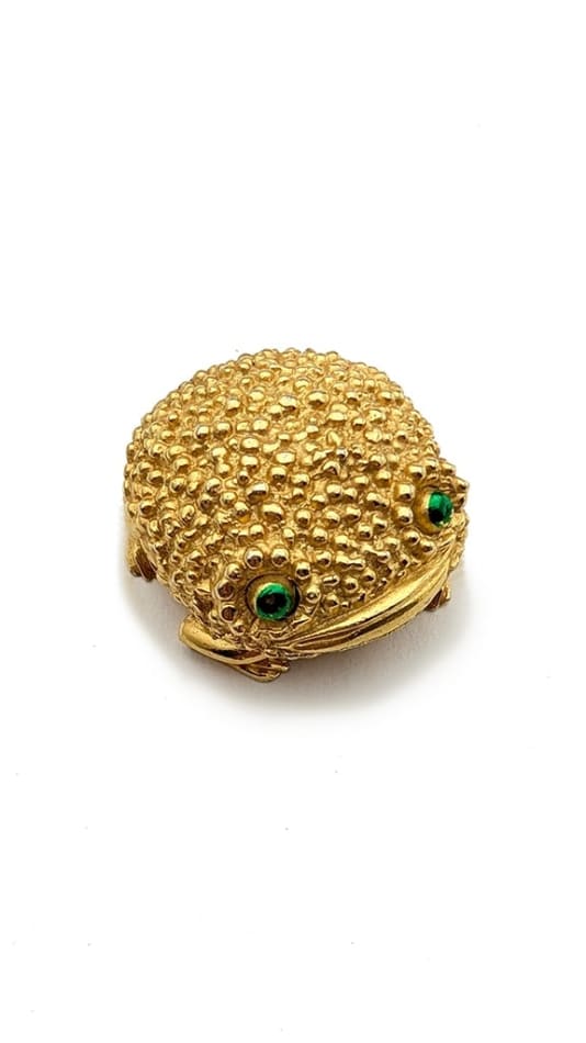 gold frog shaped compact with green eyes