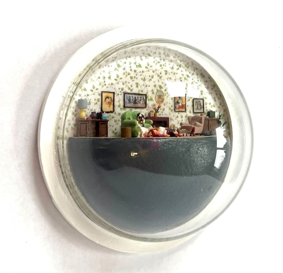 sculpture in glass case