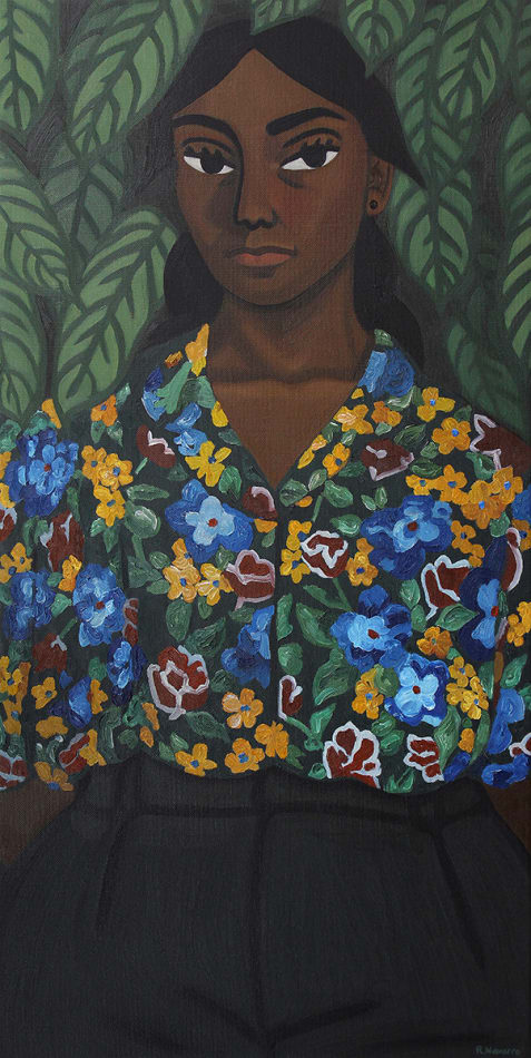 portrait of a woman in a floral shirt standing in front of dark green leaves