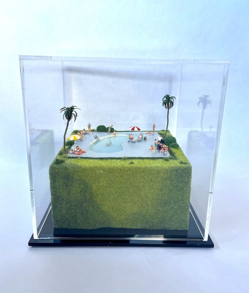 sculpture in glass case
