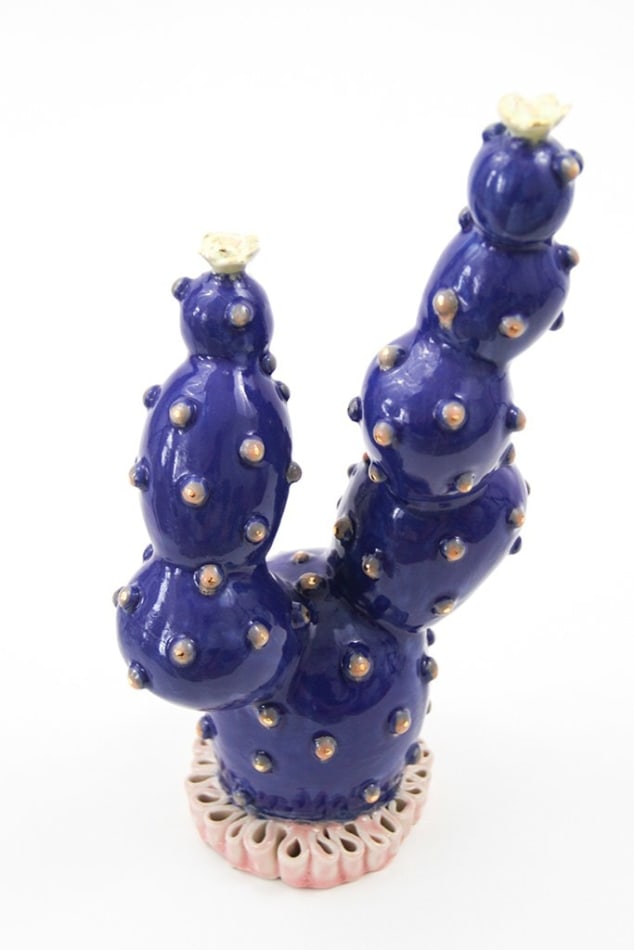 Jen Dwyer sculpture - blue cactus plant with large red lips on bottom