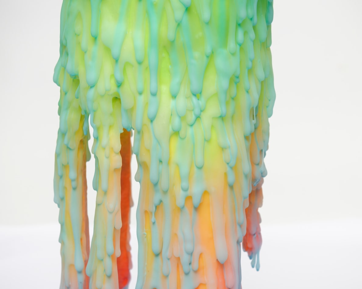 Dan Lam slime sculpture with gradient of green, red, and blue