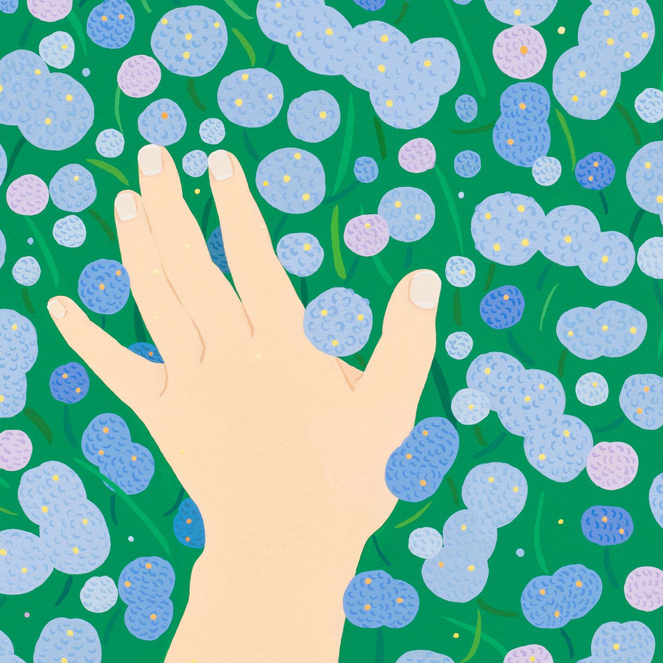 detail image of a hand reachign towards blue tones circles