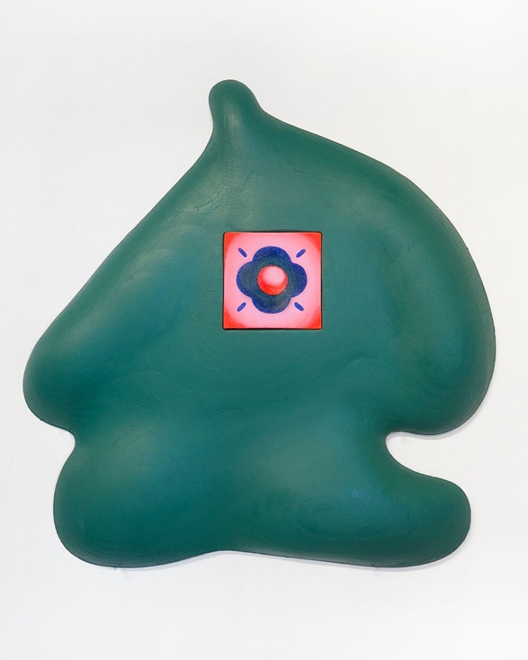 green figure by Jocelyn Tsaih with a square canvas in the middle with a purple, red, and pink painting of a flower like figure