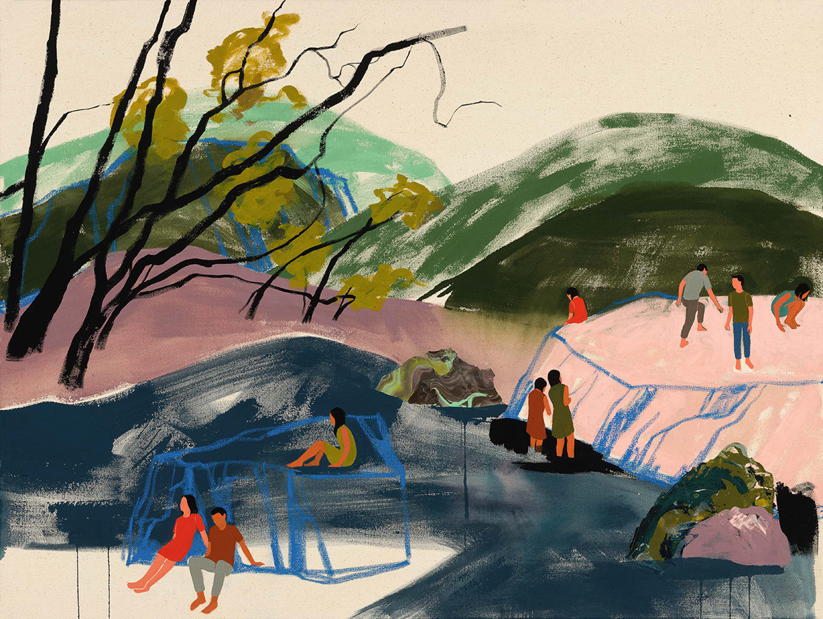 various people standing and sitting around a hilly natural environment