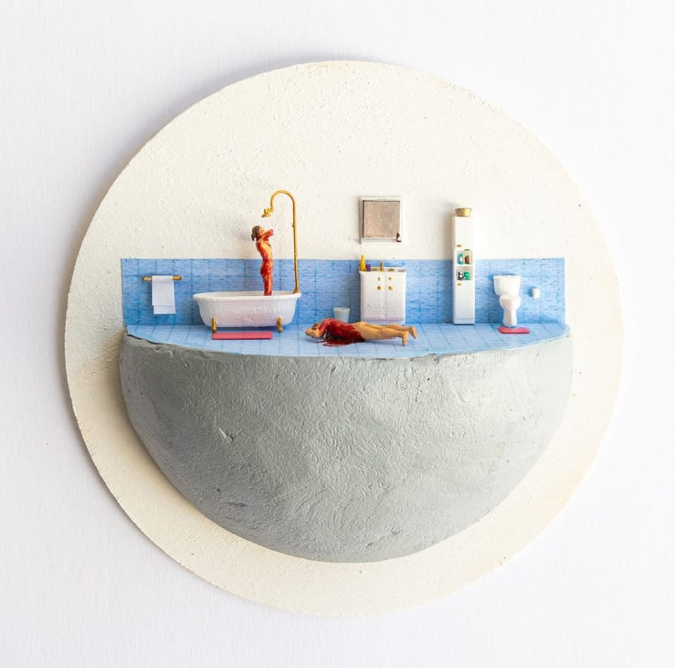 miniature diorama by Abigail Goldman a bloody woman washing herself in the shower next to a body bleeding out on the floor