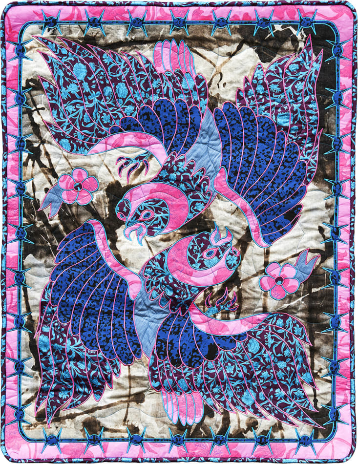 Ben Venom - hand-made quilt with pattern of two birds in dark shade of blue and bright pink.