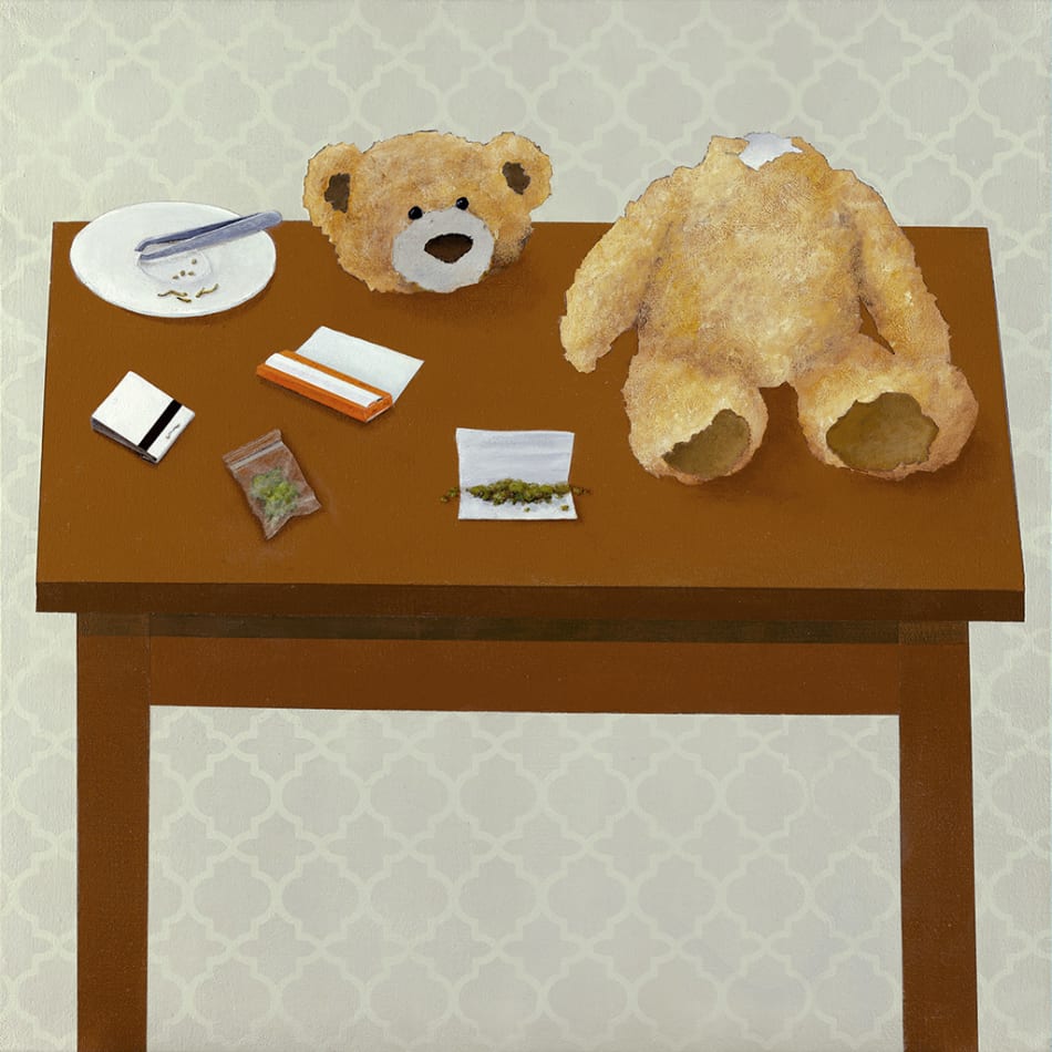 Gabe Langholtz of decapitated teddy bear with marijuana on tabletop