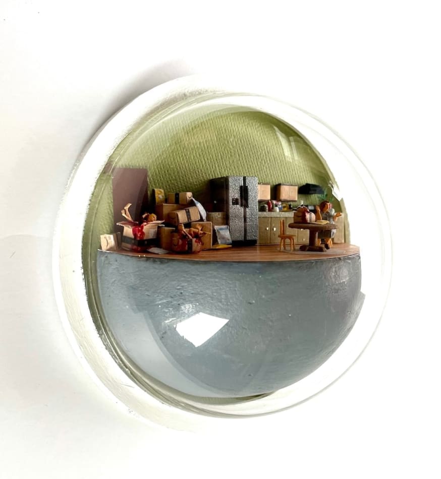 sculpture in glass case
