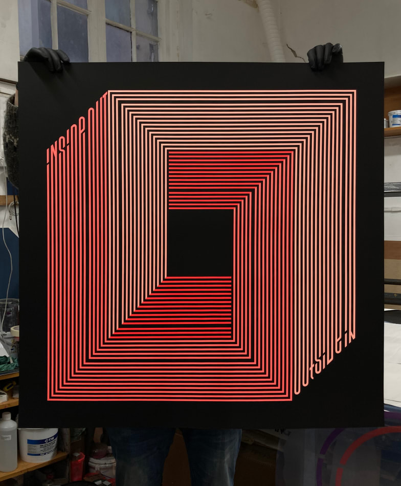 Gary Stranger, pink lettering spelling out 'inside out outside in' on black paper