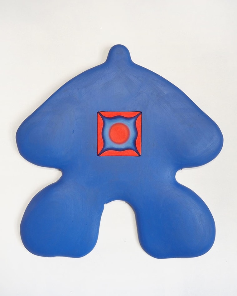 blue figure with a square canvas in the center of it with a orange circle and square surrounding it