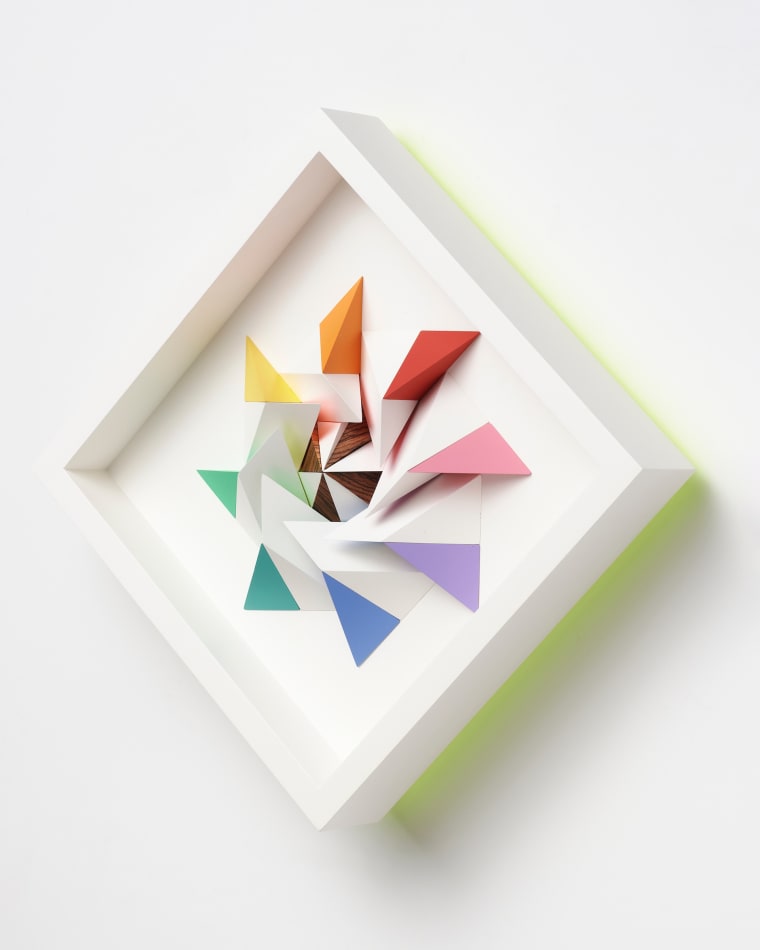 wooden geometric wall sculpture by Sean newport - rainbow