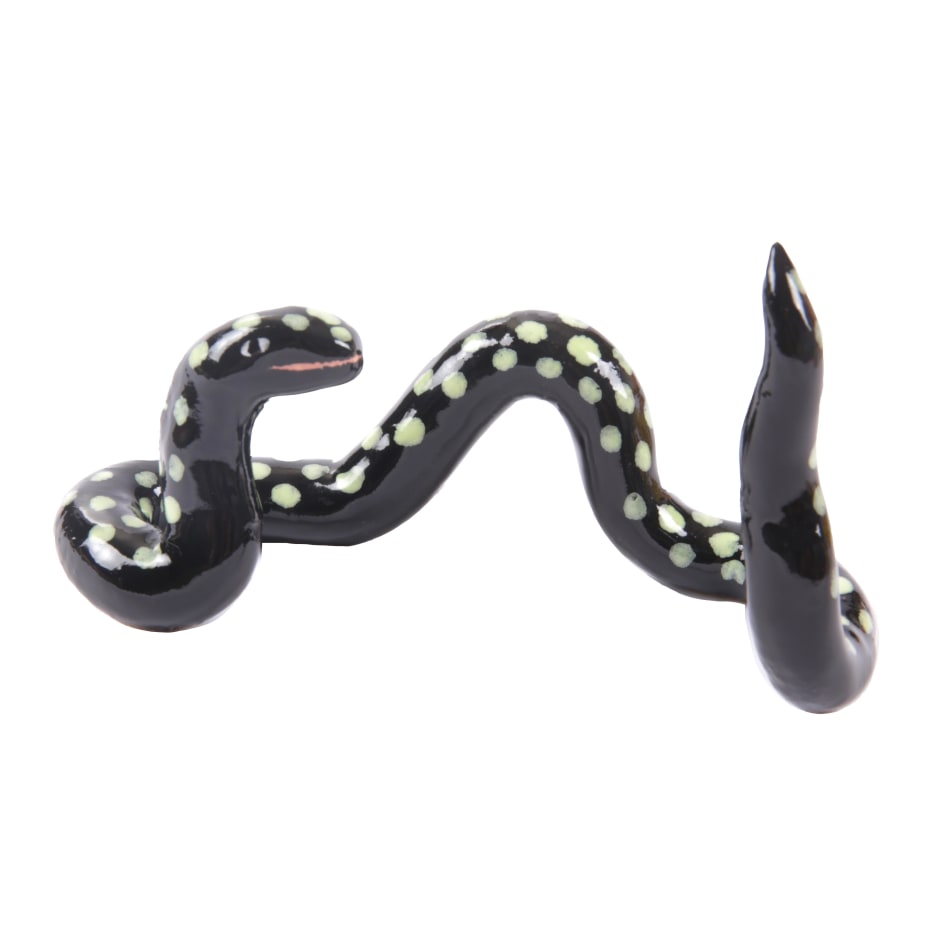 miniature sculpture of a black prehistoric snake