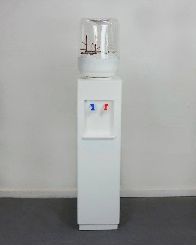 Paul Gagner Scultpure of a ship frozen in an Office water cooler