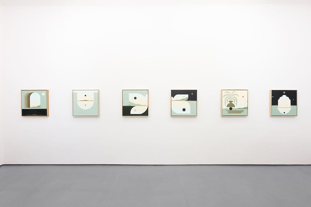 white gallery wall with blue, black, and yellow toned paintings hung evenly in a line