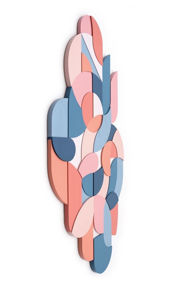Side view of a free form multicolor wood sculptural piece made up of spiral shapes and curves by artist Scott Albrecht