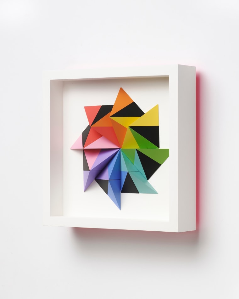 wooden geometric wall sculpture by Sean newport - rainbow