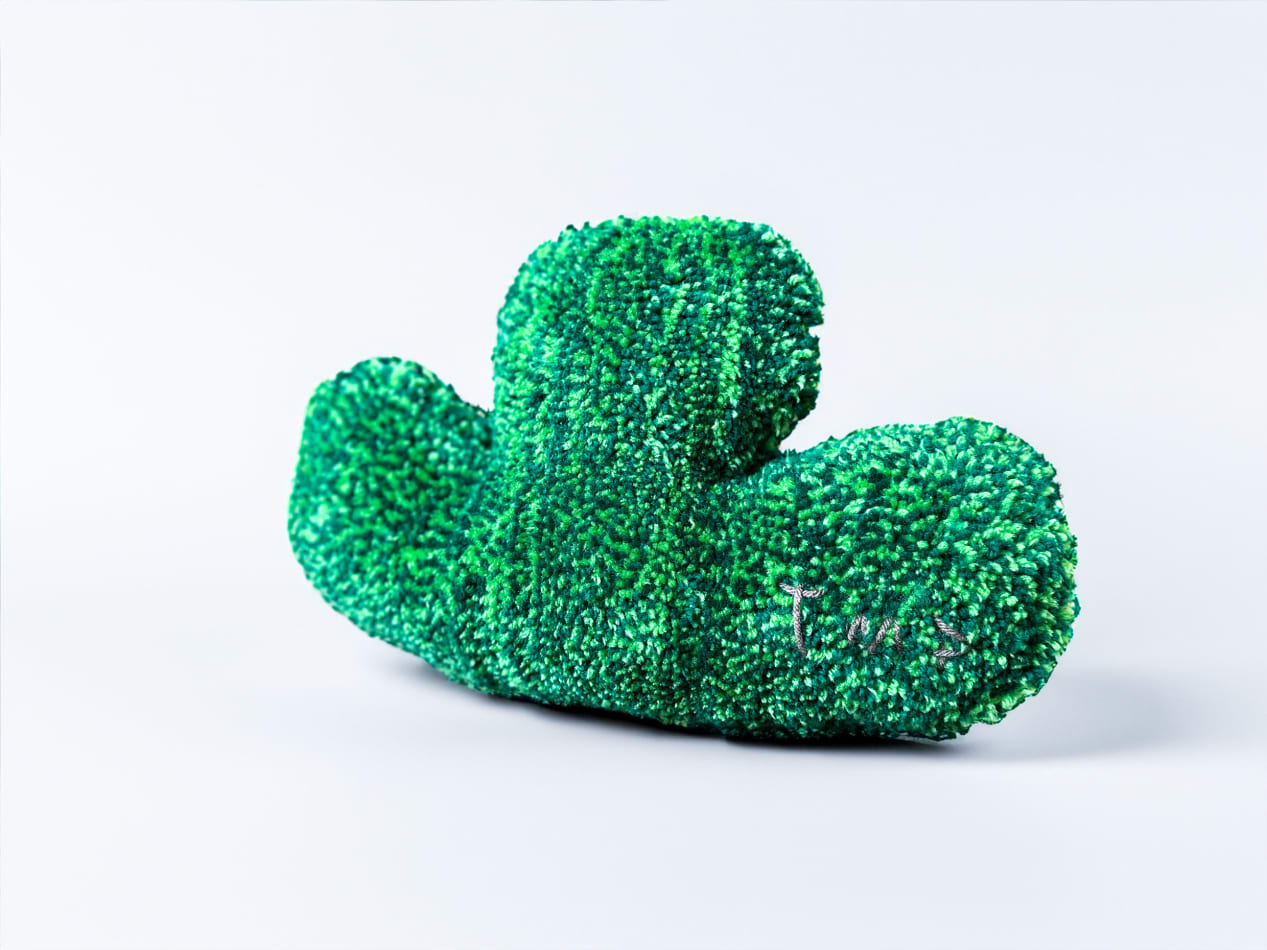 Sculpture of small leaf, emerald, pillow