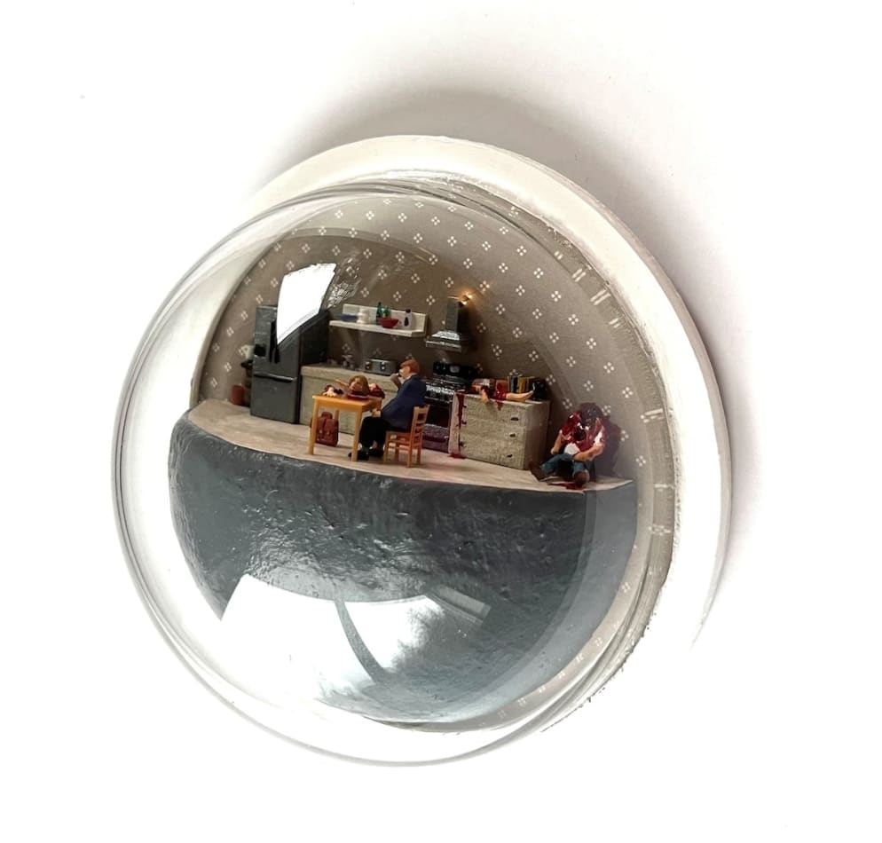 sculpture in glass case