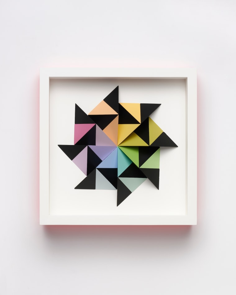 wooden geometric wall sculpture by Sean newport - rainbow