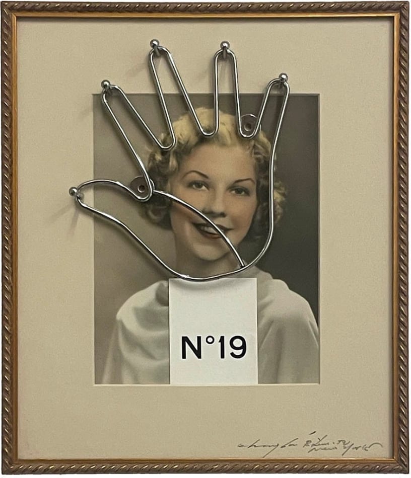 Framed photo of a woman with a metal hand outline over it
