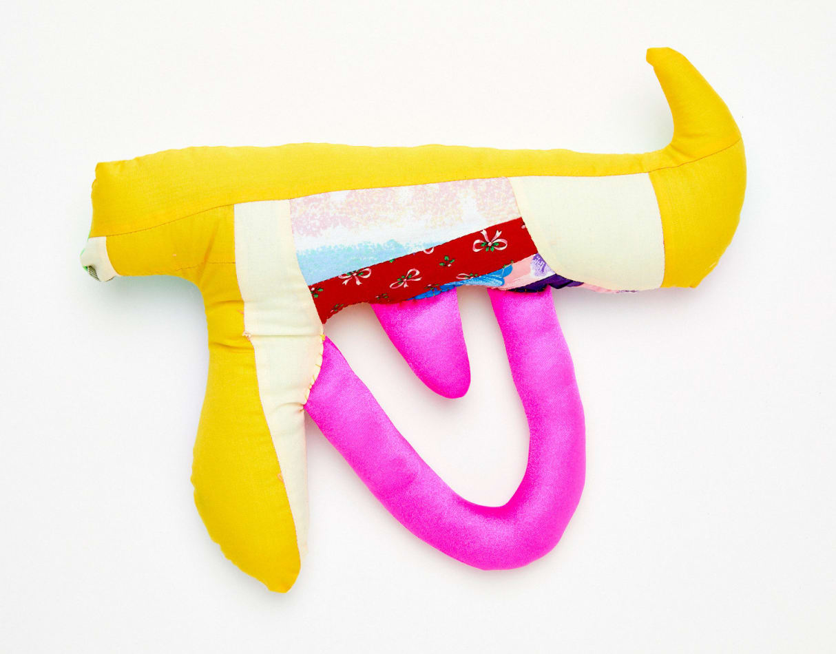 Natalie Baxter soft sculpture of gun in yellow and bright pink