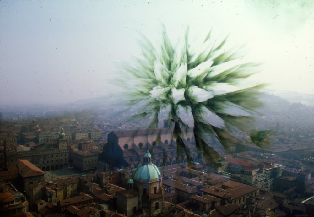 Collage from a photo of a city and an abstract geometric shape